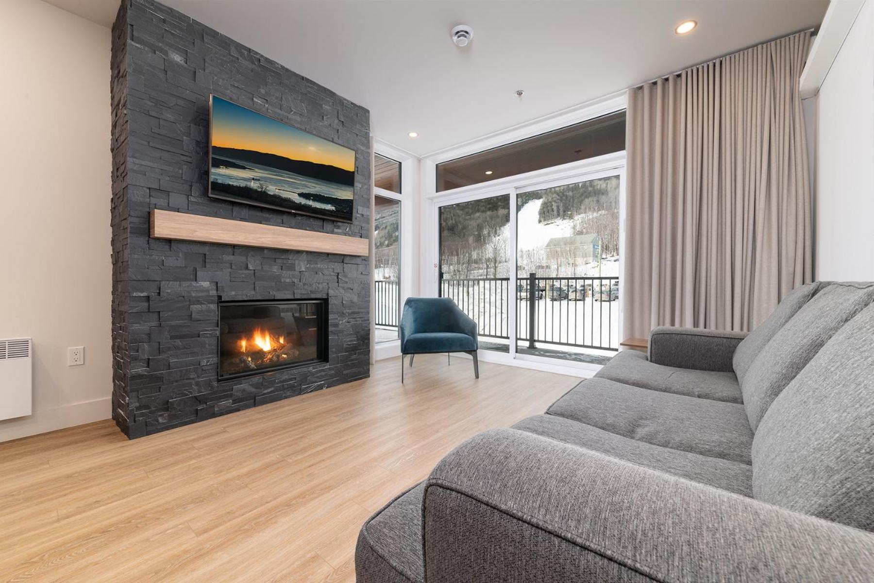 Les Appartements Du Massif De Charlevoix Петит-Ривьер-Сен-Франсуа Номер фото