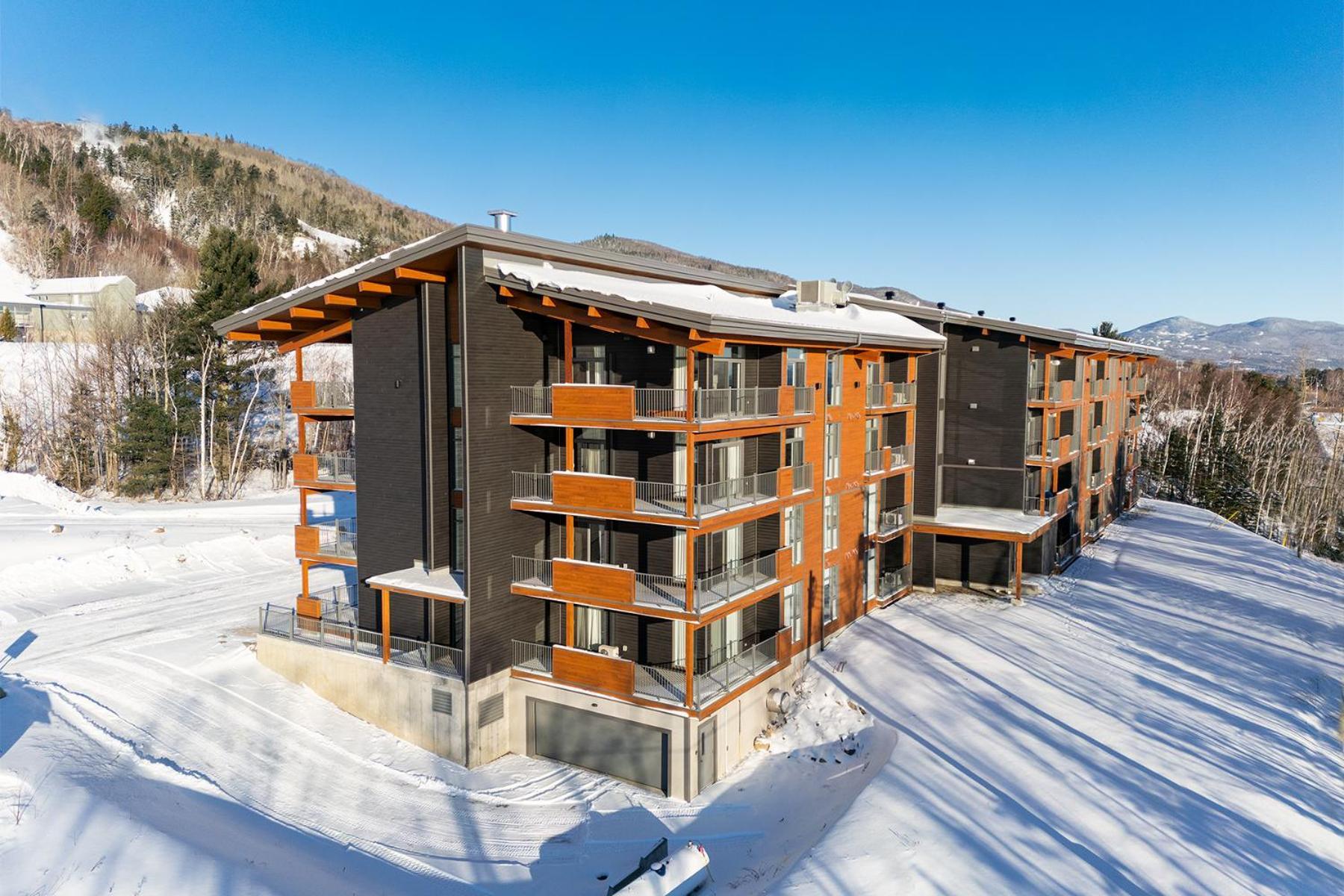 Les Appartements Du Massif De Charlevoix Петит-Ривьер-Сен-Франсуа Экстерьер фото
