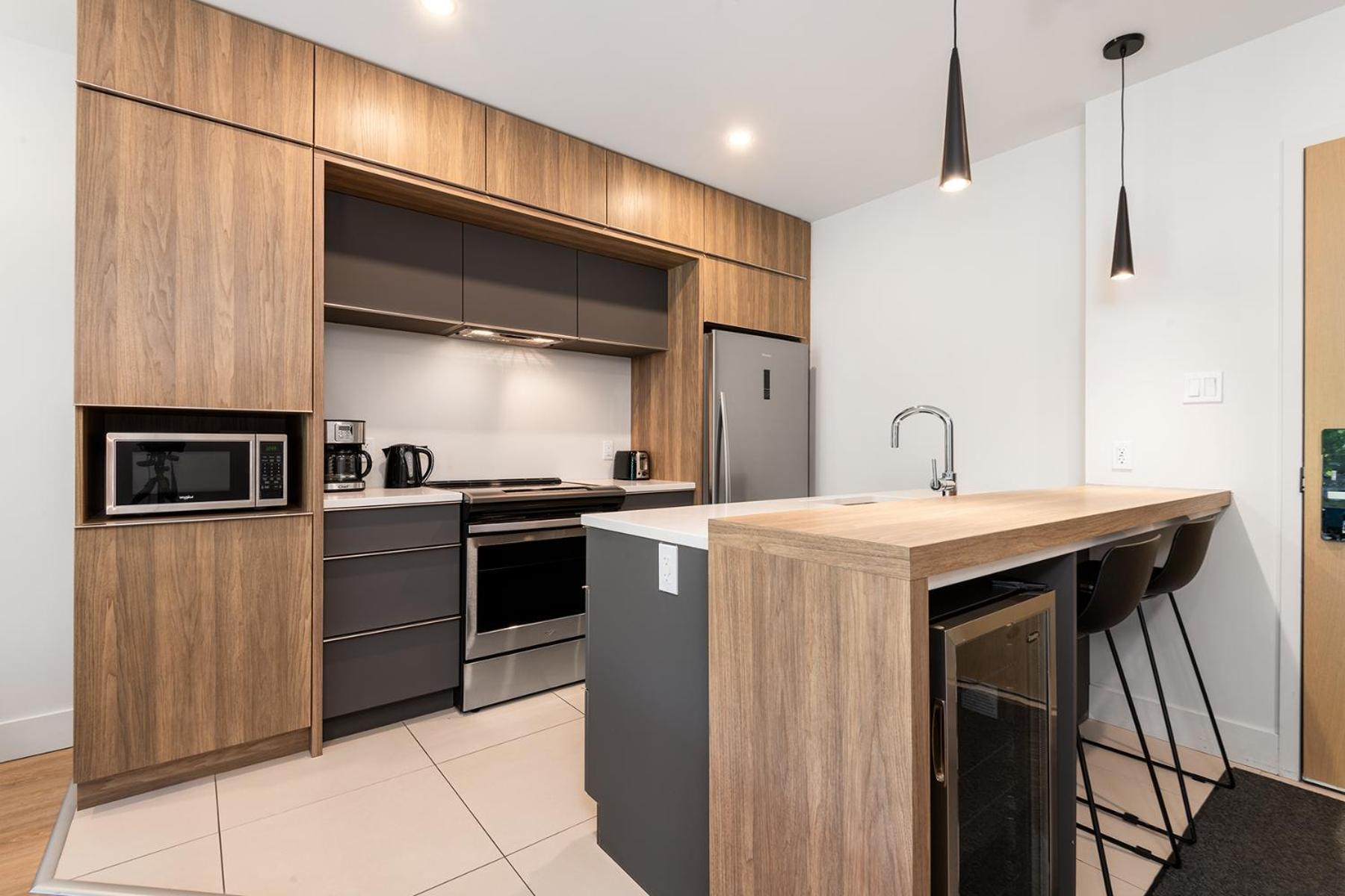 Les Appartements Du Massif De Charlevoix Петит-Ривьер-Сен-Франсуа Экстерьер фото