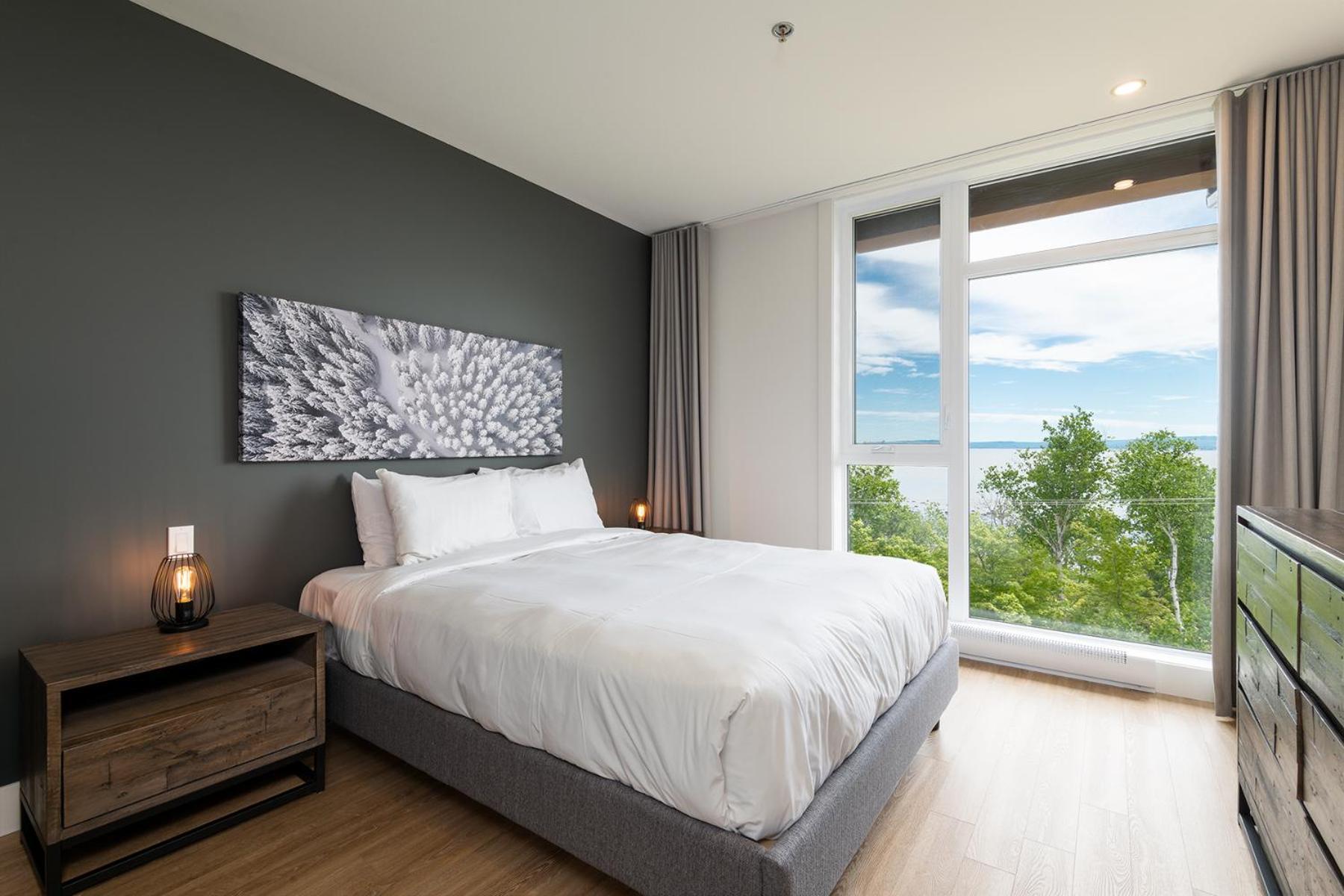 Les Appartements Du Massif De Charlevoix Петит-Ривьер-Сен-Франсуа Экстерьер фото