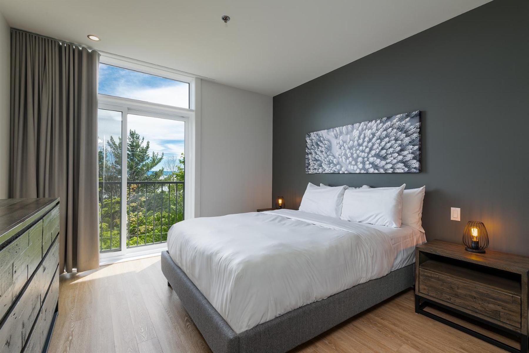 Les Appartements Du Massif De Charlevoix Петит-Ривьер-Сен-Франсуа Экстерьер фото